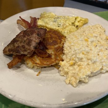 Sunrise Memphis - Cheese grits, bacon, eggs, hash browns - Breakfast & Brunch Near Me - Memphis, Tennessee Sunrise Memphis - Cheese grits, bacon, eggs, hash browns - Breakfast & Brunch Near Me - Memphis, Tennessee