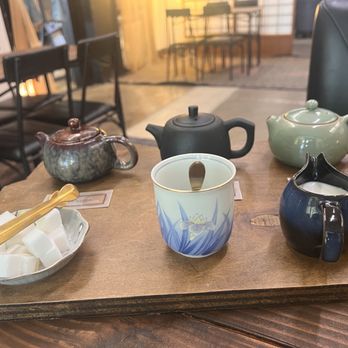 Isla Tea Lounge - Visually inviting flight. Aren't these little tea pots cute. - Tea Rooms Near Me - Fresno, California