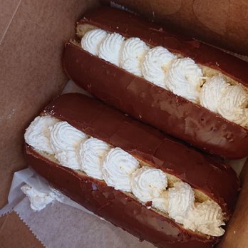 Friendly Donuts - Fresh, fluffy chocolate bars with the white vanilla whipped cream instead of gooey custard cream. Yum! - Donuts Near Me - Orange, California Friendly Donuts - Fresh, fluffy chocolate bars with the white vanilla whipped cream instead of gooey custard cream. Yum! - Donuts Near Me - Orange, California