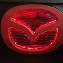 Radio-Active Car Audio - Fully customized trunk and amplifier rack for this Mazda