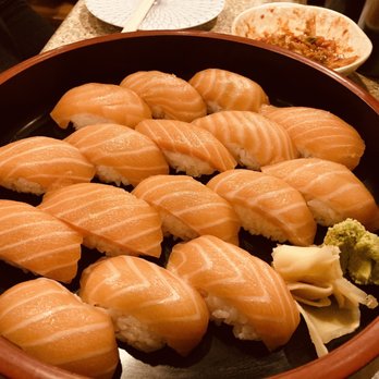 Genki - Salmon nigiri sushi, homemade kimchi (background) - Japanese Near Me - Wilmington, North Carolina