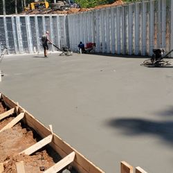 High Peak Construction - Superior Wall System and concrete pad.