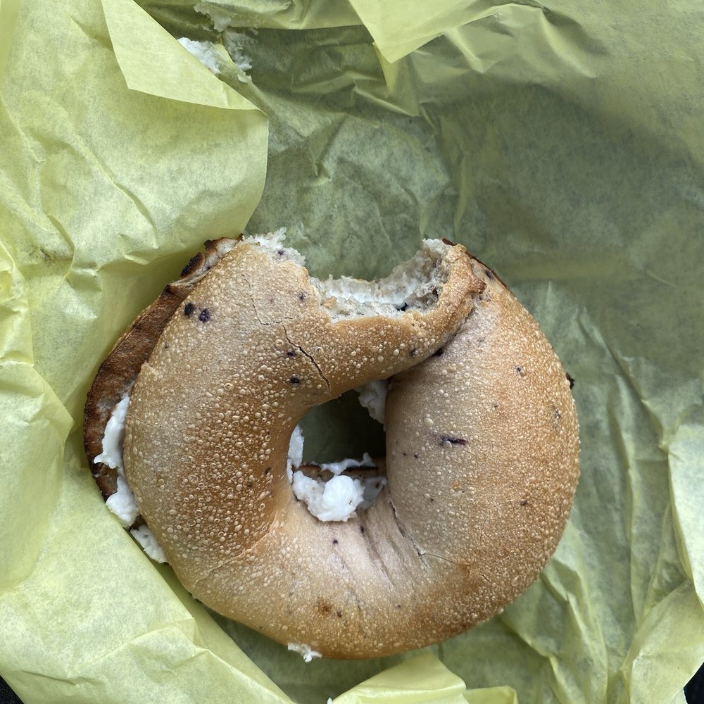 Puddletown Bagels - Blueberry bagel with vegan cream cheese - Cafes Near Me - Portland, Oregon Puddletown Bagels - Blueberry bagel with vegan cream cheese - Cafes Near Me - Portland, Oregon