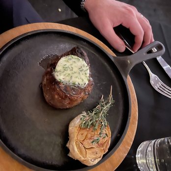 A Restaurant - Filet Mignon. So yummy. Side of garlic is incredible. - New American Near Me - Newport Beach, California
