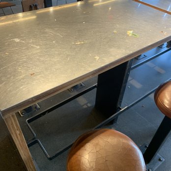 Chipotle Mexican Grill - Table covered in lettuce and cheese. - Mexican Near Me - Middletown, Rhode Island Chipotle Mexican Grill - Table covered in lettuce and cheese. - Mexican Near Me - Middletown, Rhode Island