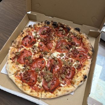 Tricycle Pizza - Three meats soft dough wood fired Pizza - Pizza Near Me - Seaside, California