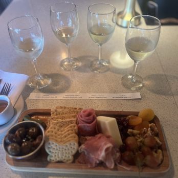 Eola Wine Company - Charcuterie and wine flight - Wine Bars Near Me - Orlando, Florida Eola Wine Company - Charcuterie and wine flight - Wine Bars Near Me - Orlando, Florida