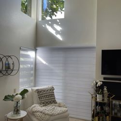 Sunburst Shutters & Window Fashions