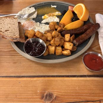 Saskatoon Farm - Breakfast: 2 sausage links, 2 eggs, potatoes, fruit and toast. Jam & ketchup. - Farmers Market Near Me - De Winton, Alberta