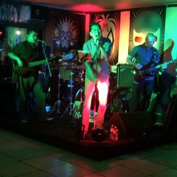 Mi Barra - a band performing in a dimly lit room - Bars Near Me - Chula Vista, California