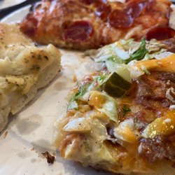 Favorite's Pizzeria - Big Mac slice, cheese and pepperoni slice and garlic bread