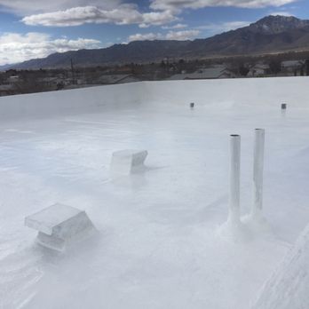 Texas Rubberized Roof Coating - a view of a flat roof - Roofing Near Me - El Paso, Texas Texas Rubberized Roof Coating - a view of a flat roof - Roofing Near Me - El Paso, Texas
