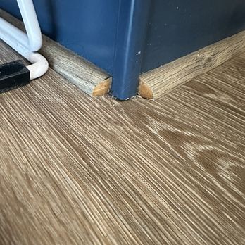 Trucor Construction - The trim that was placed under our kitchen island- an eyesore with rough cut edges - General Contractors Near Me - Huntington Beach, California Trucor Construction - The trim that was placed under our kitchen island- an eyesore with rough cut edges - General Contractors Near Me - Huntington Beach, California