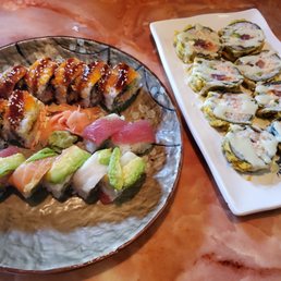 two plates of sushi two plates of sushi