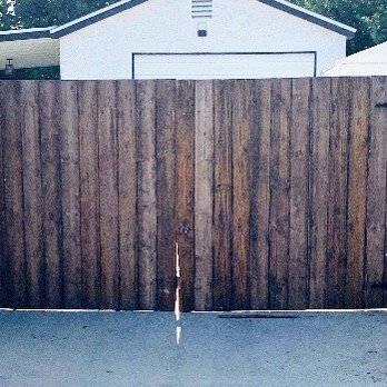 Prime Access Control - My gate before Prime Access Control replaced it. It had fallen apart on a recent windy day and it was being held together my paracord. - Garage Door Services Near Me Prime Access Control - My gate before Prime Access Control replaced it. It had fallen apart on a recent windy day and it was being held together my paracord. - Garage Door Services Near Me