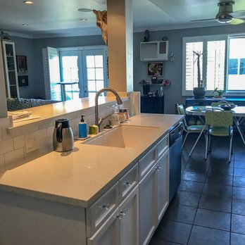 Cedars Builders - Same kitchen cabinets, new countertops, backsplashes, and a fresh paint job does a kitchen good. - General Contractors Near Me - Los Angeles, California