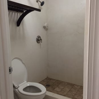 Carmel Inn and Suites - The shower and potty - Hotels Near Me - Thibodaux, Louisiana