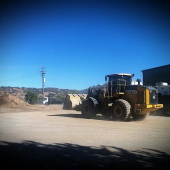 Quantum Construction Company - a bulldozer moving dirt - Masonry/Concrete Near Me Quantum Construction Company - a bulldozer moving dirt - Masonry/Concrete Near Me