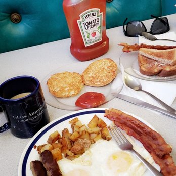 Andre's Diner - a breakfast of eggs, bacon, sausage, hash browns, and toast - Diners Near Me - Manchester, New Hampshire