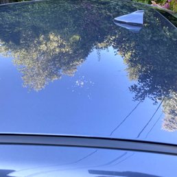 Bird poop still stuck on car after going through a wash. Bird poop still stuck on car after going through a wash.
