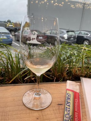 Photo of Glacier View Cellars - Woodinville, WA, US. a glass of white wine