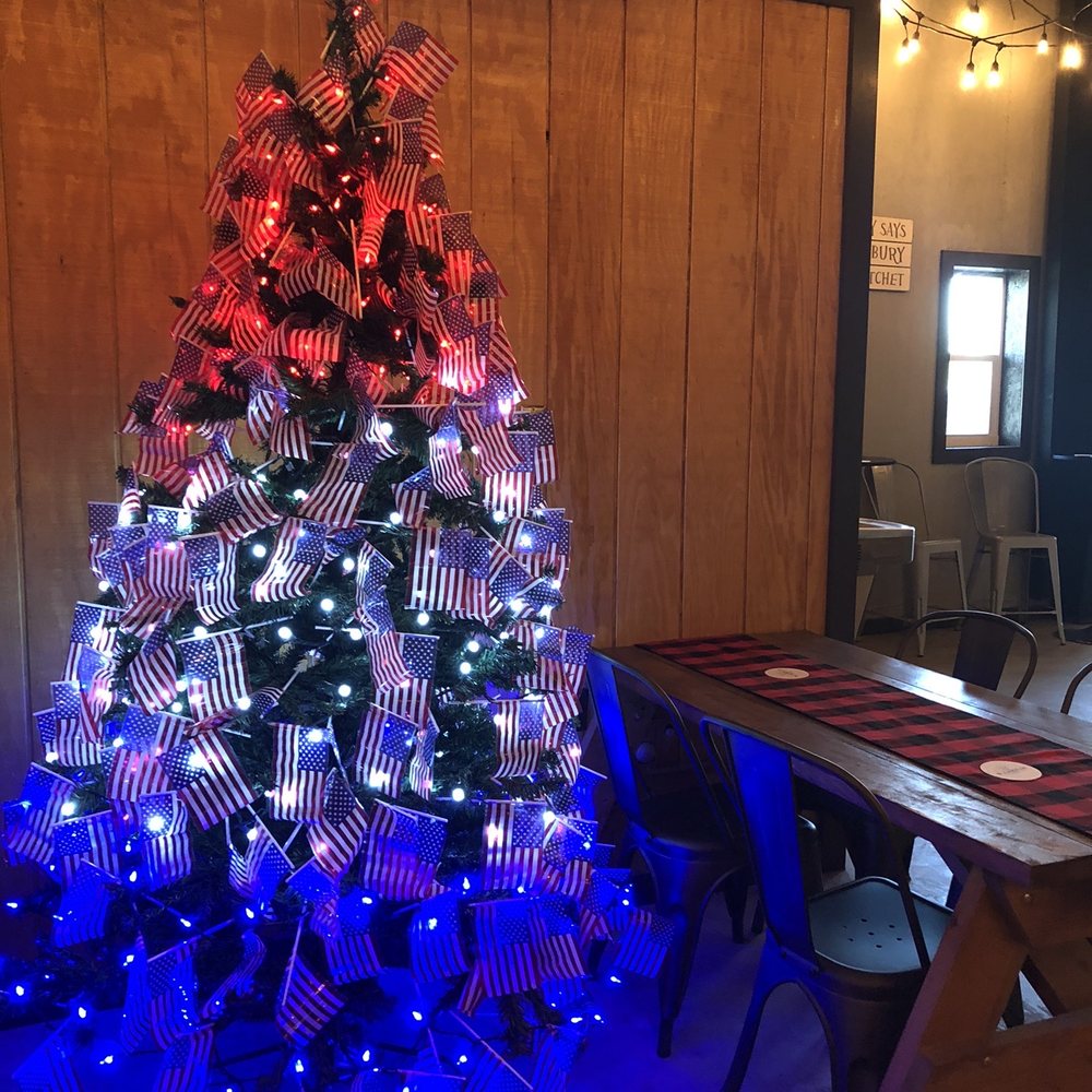 Stumpy’s Hatchet House - Love this American Flag tree! - Axe Throwing Near Me - Tampa, Florida Stumpy’s Hatchet House - Love this American Flag tree! - Axe Throwing Near Me - Tampa, Florida