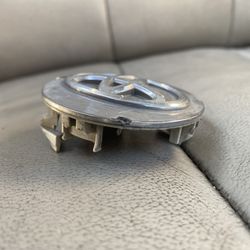 Tuffy Tire & Auto Service Center - Used a small flathead screwdriver to remove center caps