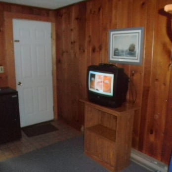 Pine Knot Motel - The TV - had local cable.  Note the knotty pine walls at the Pine Knot Motel. - Hotels Near Me - South Yarmouth, Massachusetts