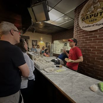 Scott's Pizza Tours - Scott showing us how pita became pizza - Pizza Near Me Scott's Pizza Tours - Scott showing us how pita became pizza - Pizza Near Me