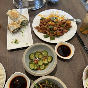 Major Dumplings - From bottom to top: Garlic Seaweed Salad, Cucumber Salad, Kung Pao Chicken, Small Beef Roll Plate, Pork & Celery Dumpling - Asian Fusion Near Me - Diamond Bar, California Major Dumplings - From bottom to top: Garlic Seaweed Salad, Cucumber Salad, Kung Pao Chicken, Small Beef Roll Plate, Pork & Celery Dumpling - Asian Fusion Near Me - Diamond Bar, California