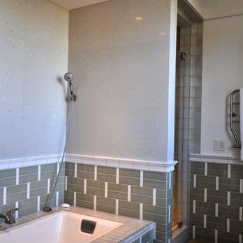 All Tile - a bathtub and shower in a bathroom - Flooring Near Me - Blaine, Washington All Tile - a bathtub and shower in a bathroom - Flooring Near Me - Blaine, Washington