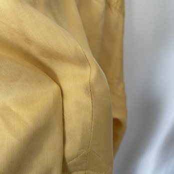 Tailor Fit Cleaners - New stain that came after sewing up the rip - Sewing & Alterations Near Me - Pflugerville, Texas Tailor Fit Cleaners - New stain that came after sewing up the rip - Sewing & Alterations Near Me - Pflugerville, Texas