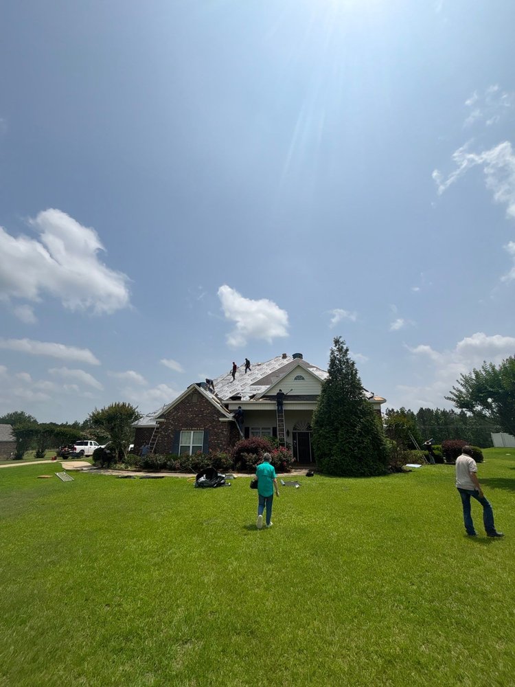 Slide of Ark La Miss Roofing