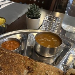 Onion Rava Masala Dosa (masala on the side); sambar, tomato chutney, coconut chutney, masala (potato)