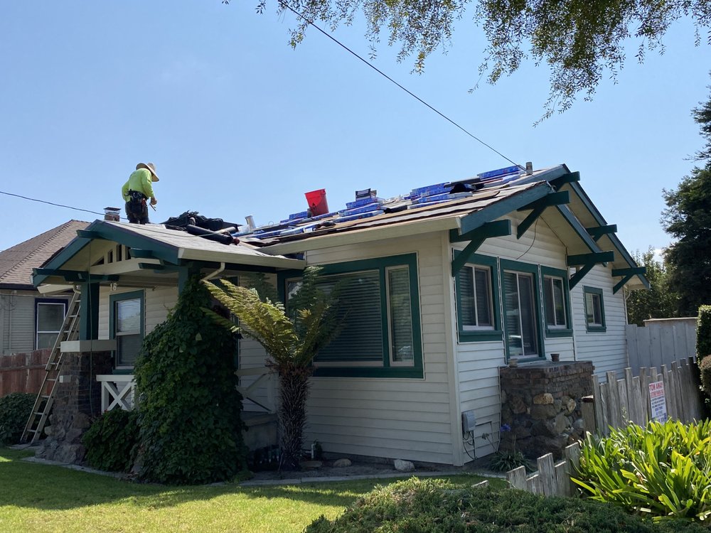 Slide of Urrutia Roofing