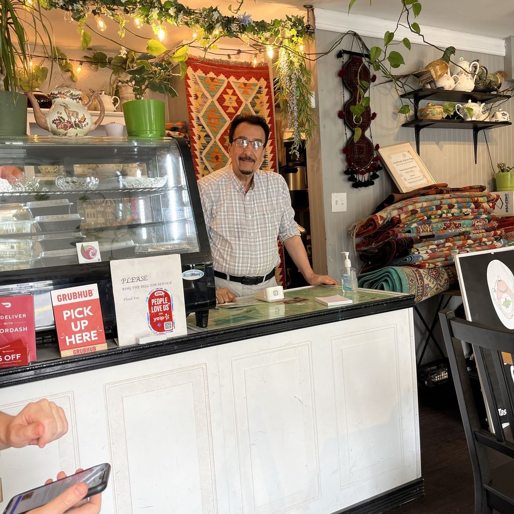 Spring Cafe - Hamada, the owner behind the counter - Cafes Near Me - Baltimore, Maryland Spring Cafe - Hamada, the owner behind the counter - Cafes Near Me - Baltimore, Maryland