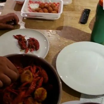 Crawfish Cafe - 6lb crawfish special and mix. Corn potatoes, Hush puppies. 12 wings. - Seafood Near Me - Houston, Texas
