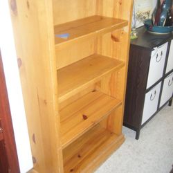 A Second Chance Resale - Knotty Pine Bookshelf Or Case Solid Wood Adjustable Shelves Its 32'' Wide 12 1/2'' Deep 53'' Tall Find Us On Facebook Call 928 713 1599 Or S