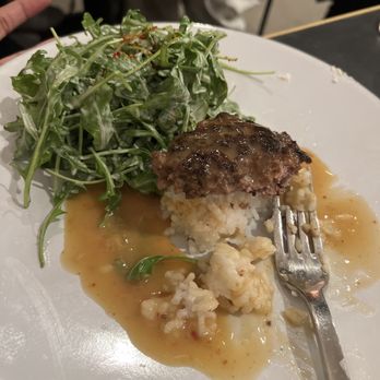 Single Shot - Over easy egg with a burger patty with gravy on a bed of rice. - Bars Near Me - Seattle, Washington