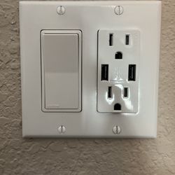 Wilson Electrical Inspections - After: Receptacle with USB ports installed next to existing switch.