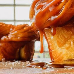 Izola - Our Brown Butter Caramel Knot is one you won't want to share...House made caramel, with a light sprinkle of sea salt. Hot from the oven!