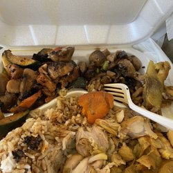 Taiwan Cafe - Curry chicken w potatoes and carrots, chicken and zucchini and mushrooms with soybeans. All was excellent. $9 cash only.