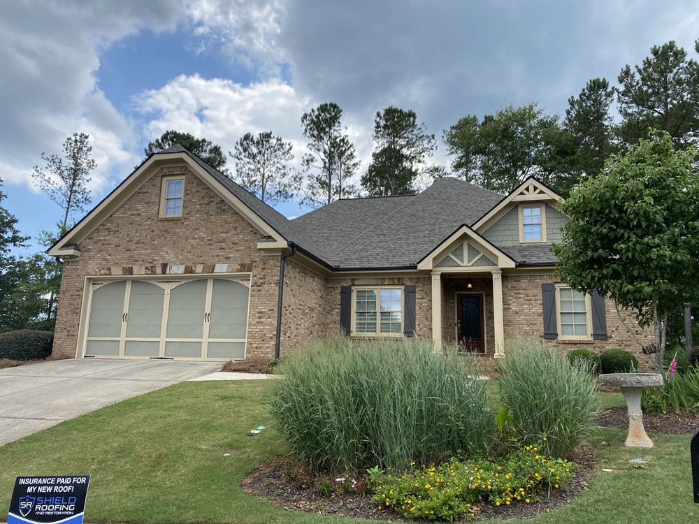 Slide of Shield Roofing and Restoration