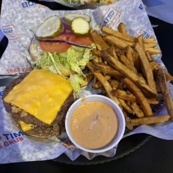Bout Time Pub & Grub - Garlic Burger and nachos in the background - Pubs Near Me - Bluffdale, Utah Bout Time Pub & Grub - Garlic Burger and nachos in the background - Pubs Near Me - Bluffdale, Utah