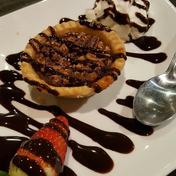 The Row - Bourbon pecan pie - Southern Near Me - Nashville, Tennessee The Row - Bourbon pecan pie - Southern Near Me - Nashville, Tennessee