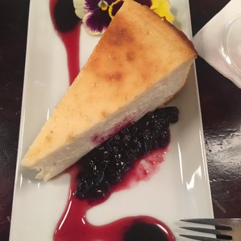 El Sur - Soooooo good! Cheesecake with blueberry compote. - Tapas Bars Near Me - Madrid, M