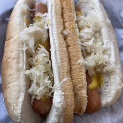 Tha Dawg House - Hot dogs with sauerkraut and yellow mustard