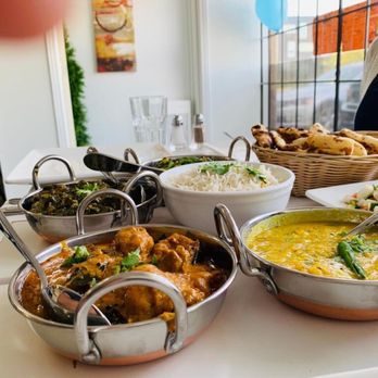 Resto indian - a variety of dishes on a table - Indian Near Me - Montreal, Quebec Resto indian - a variety of dishes on a table - Indian Near Me - Montreal, Quebec