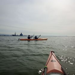 Stacked Adventures - Joes took a picture of our kayak, with USS Hornet in the background.