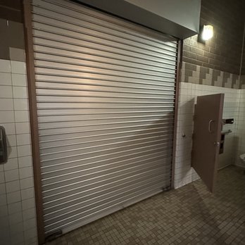 Sunset Point Rest Area - Garage door in women's bathroom - Rest Stops Near Me - Congress, Arizona
